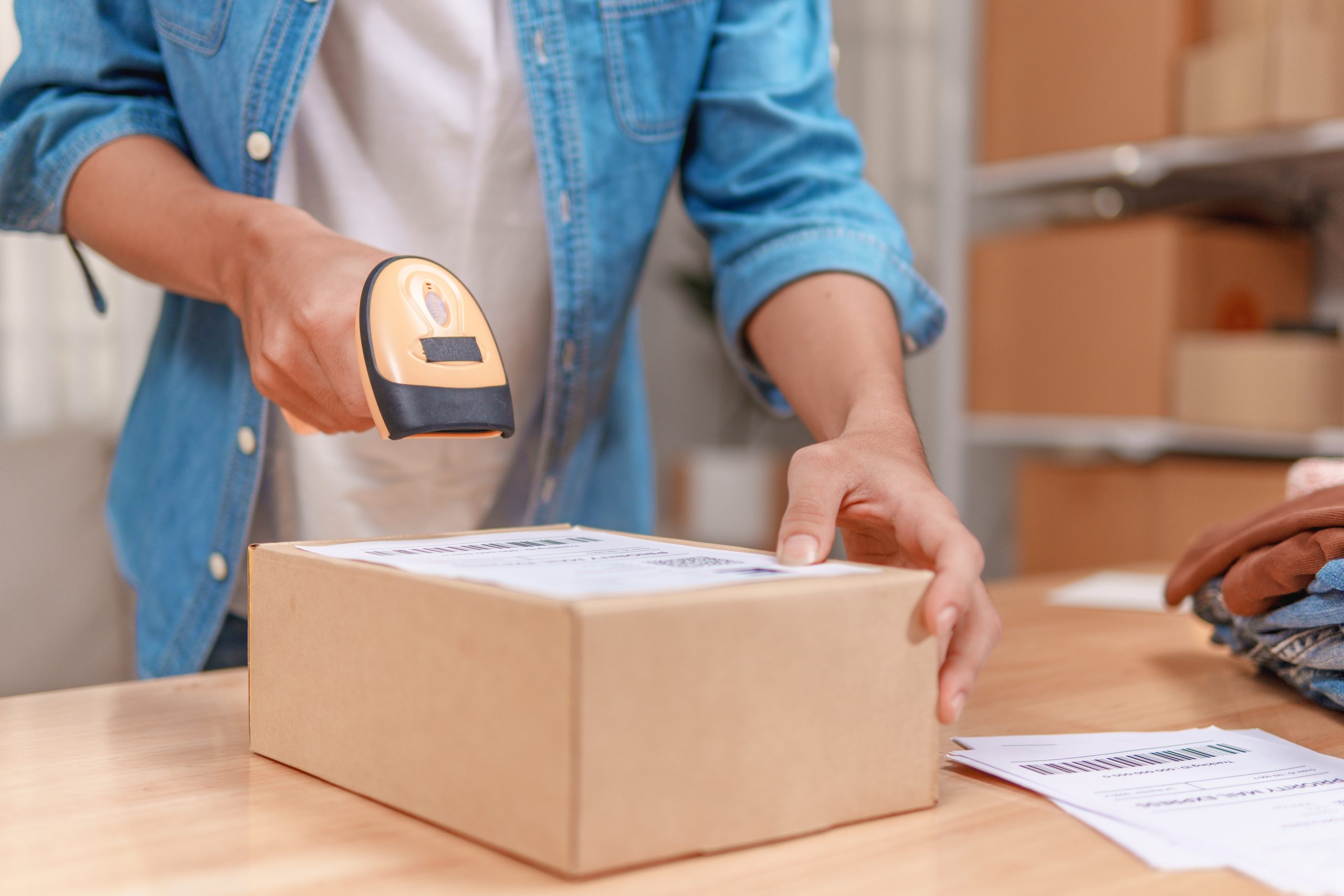 online seller packing process in warehouse e commerce space action